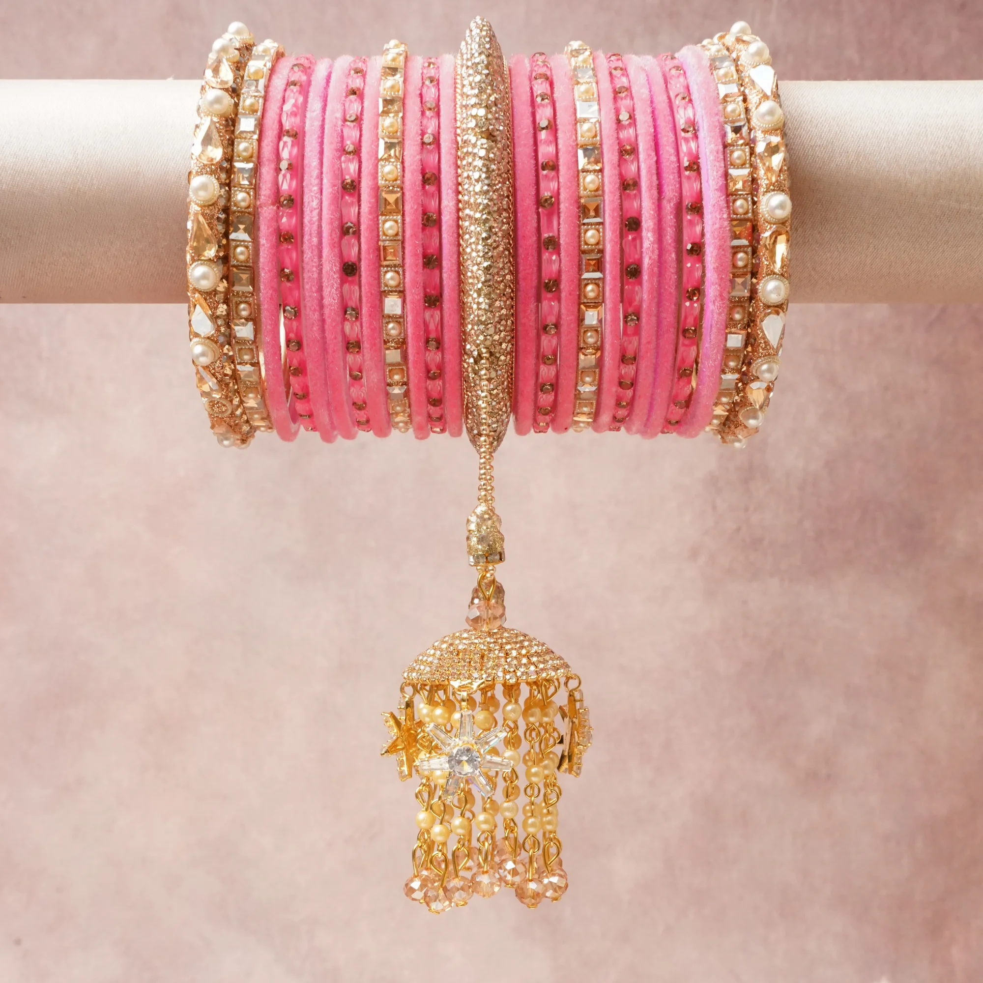 A commanding Vibrant Pink anchors this beautiful set, enriched with accents of Gold, Cream, Clear that add depth and dimension.

Featuring a striking composition of Velvet, Gold-toned Metal, Faux Pearls, Rhinestones, Glass Beads, this set carries intricate craftsmanship and strong presence. Grand in form, it is created for moments that deserve to be marked.